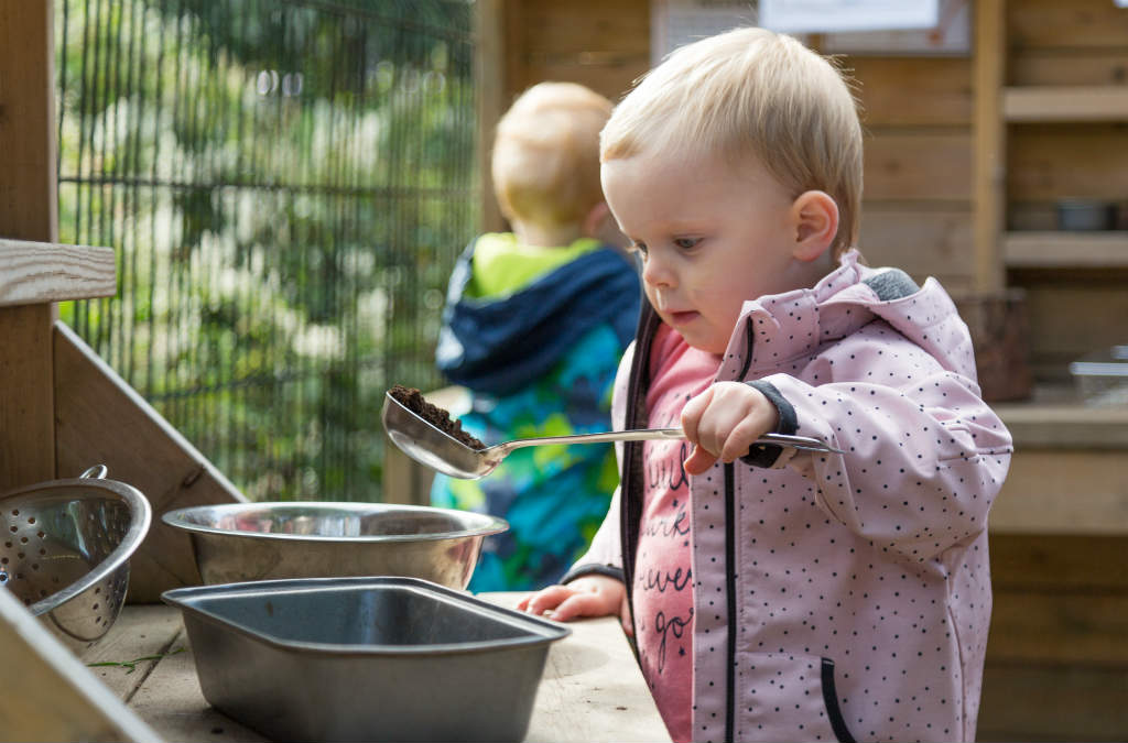 Child in outdoor play area