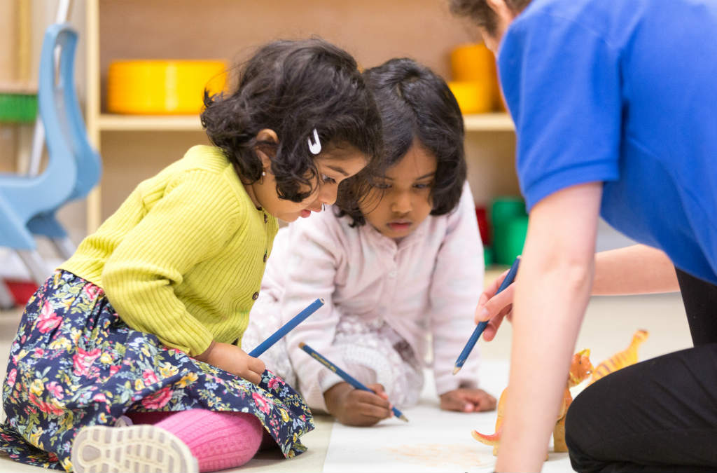 children drawing together