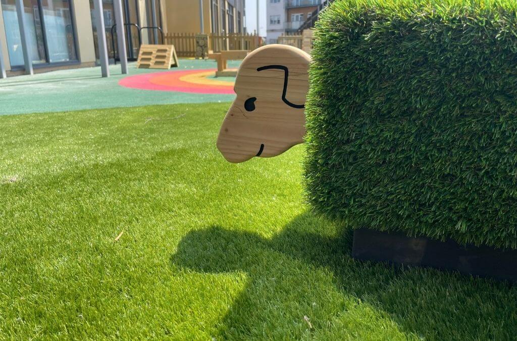 Outdoor grass nursery play area