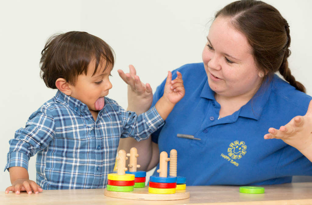Child learning with teacher