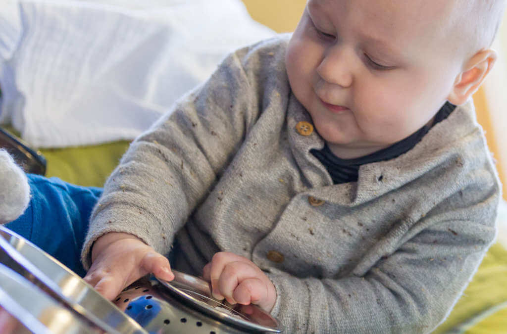 Child focusing on toy